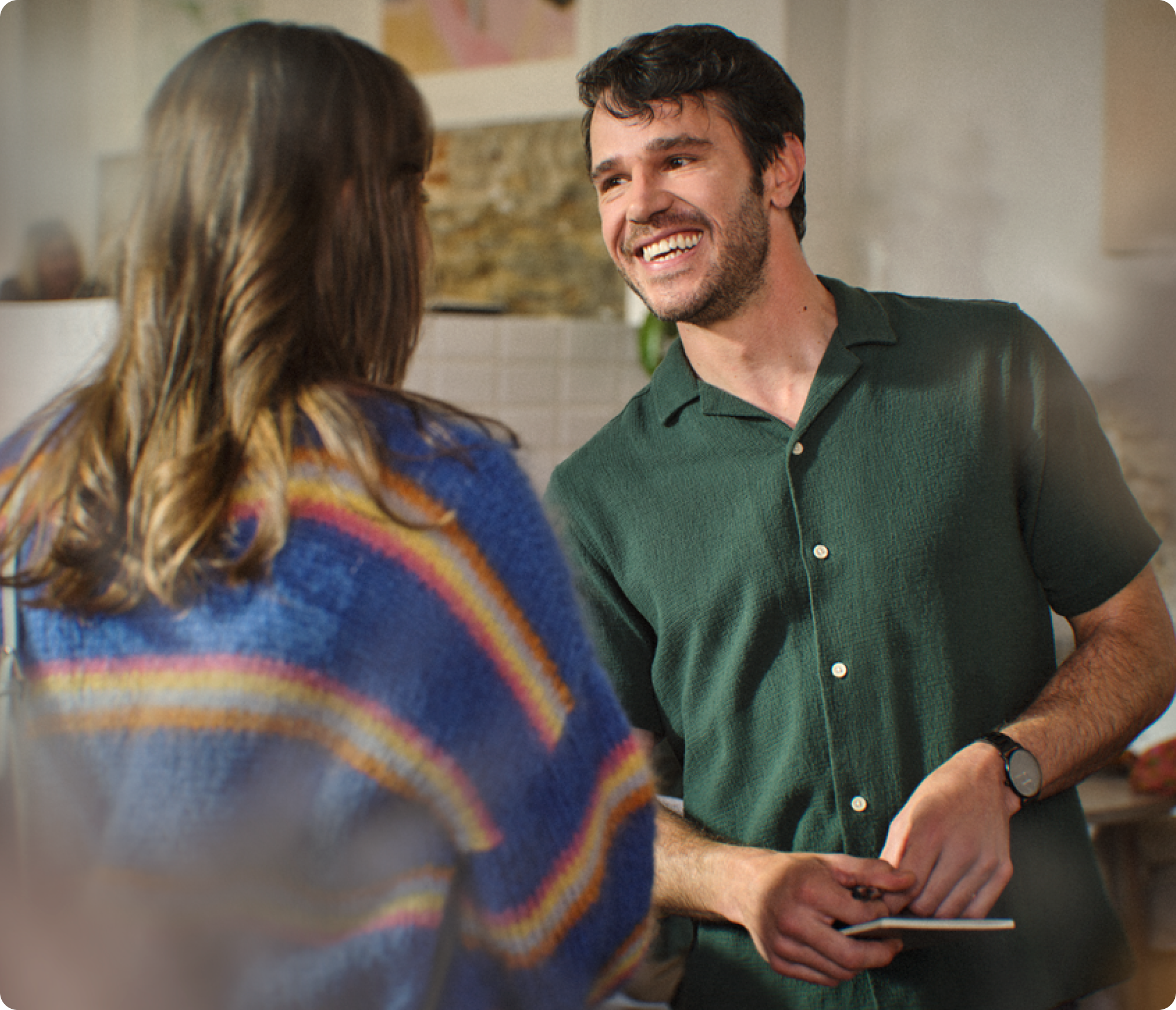 Image of a man and woman talking.